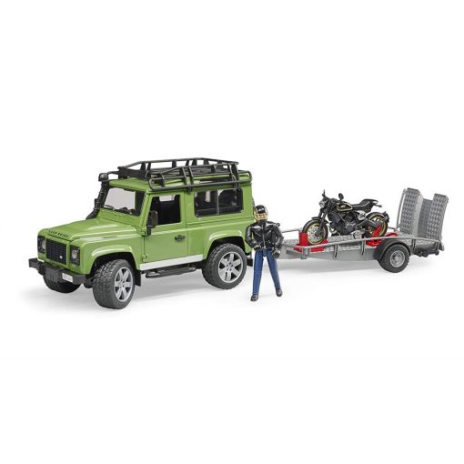 Land Rover Defender m/kerru og mótorhjóli